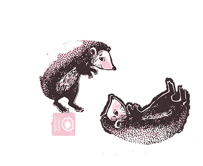 Happy hedgehogs playing with paint