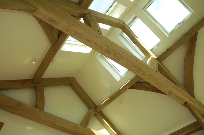 Earthborn Claypaint in Marbles creates a breathable, warm neutral finish in this oak frame property