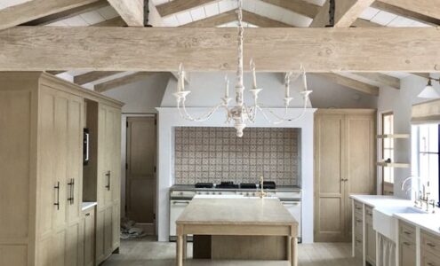 Painted white washed wooden beams.