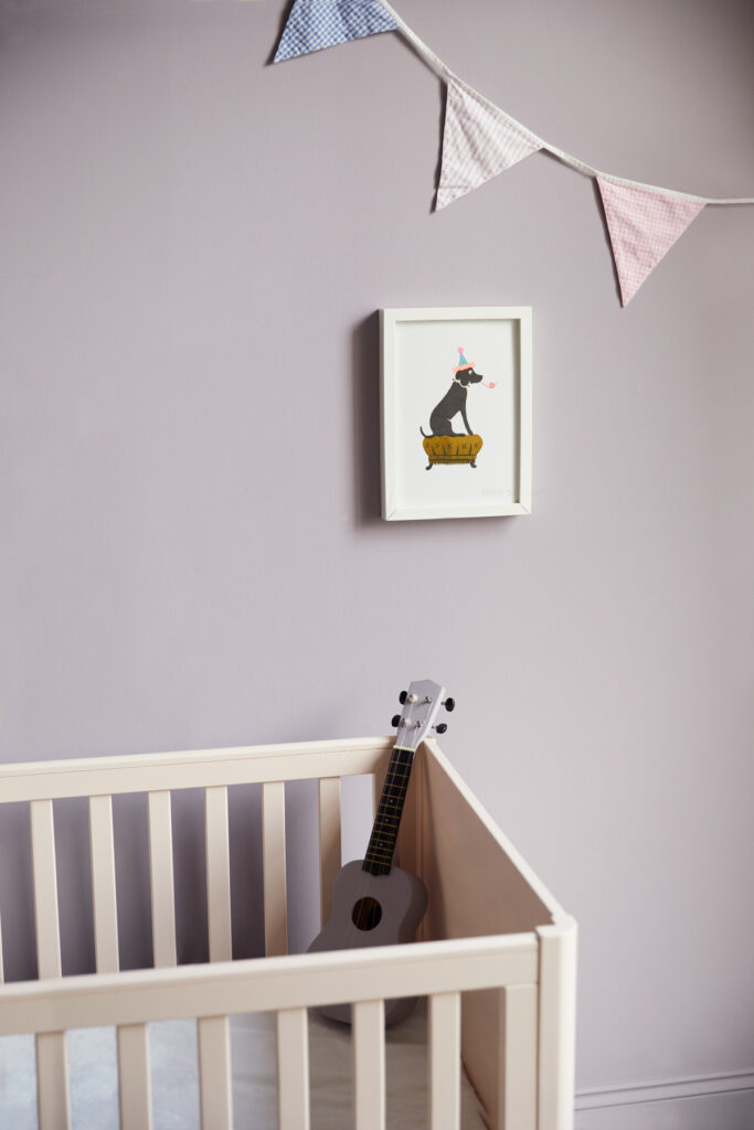 This relaxed nursery features walls in Earthborn Inglenook and cot in Peach Baby