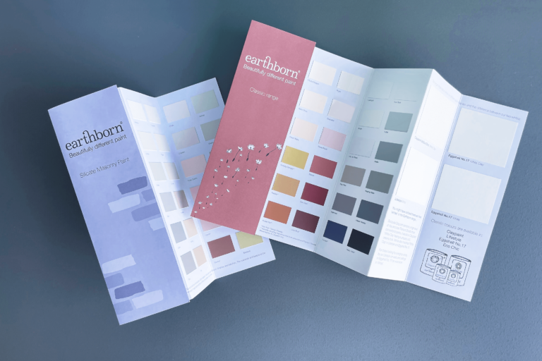 Earthborn colour cards on a blue background.