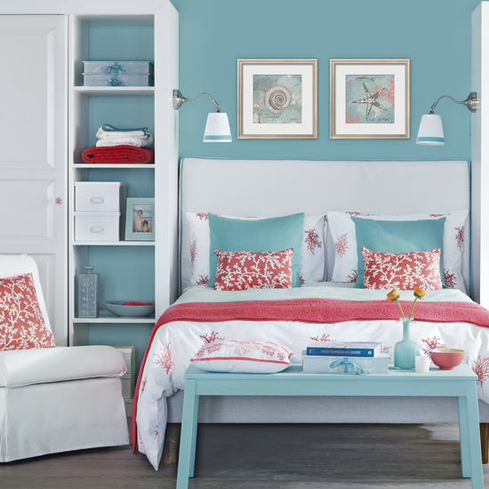 Beautiful blue, pink and white bedroom setting with a hint of a coastal theme.