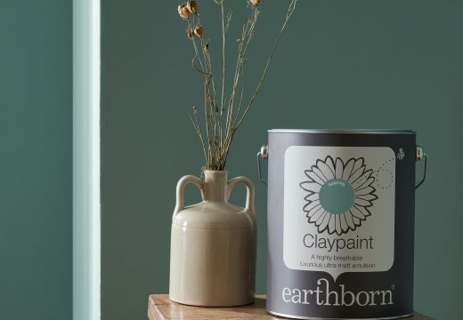 Splashing wall with paint tin.